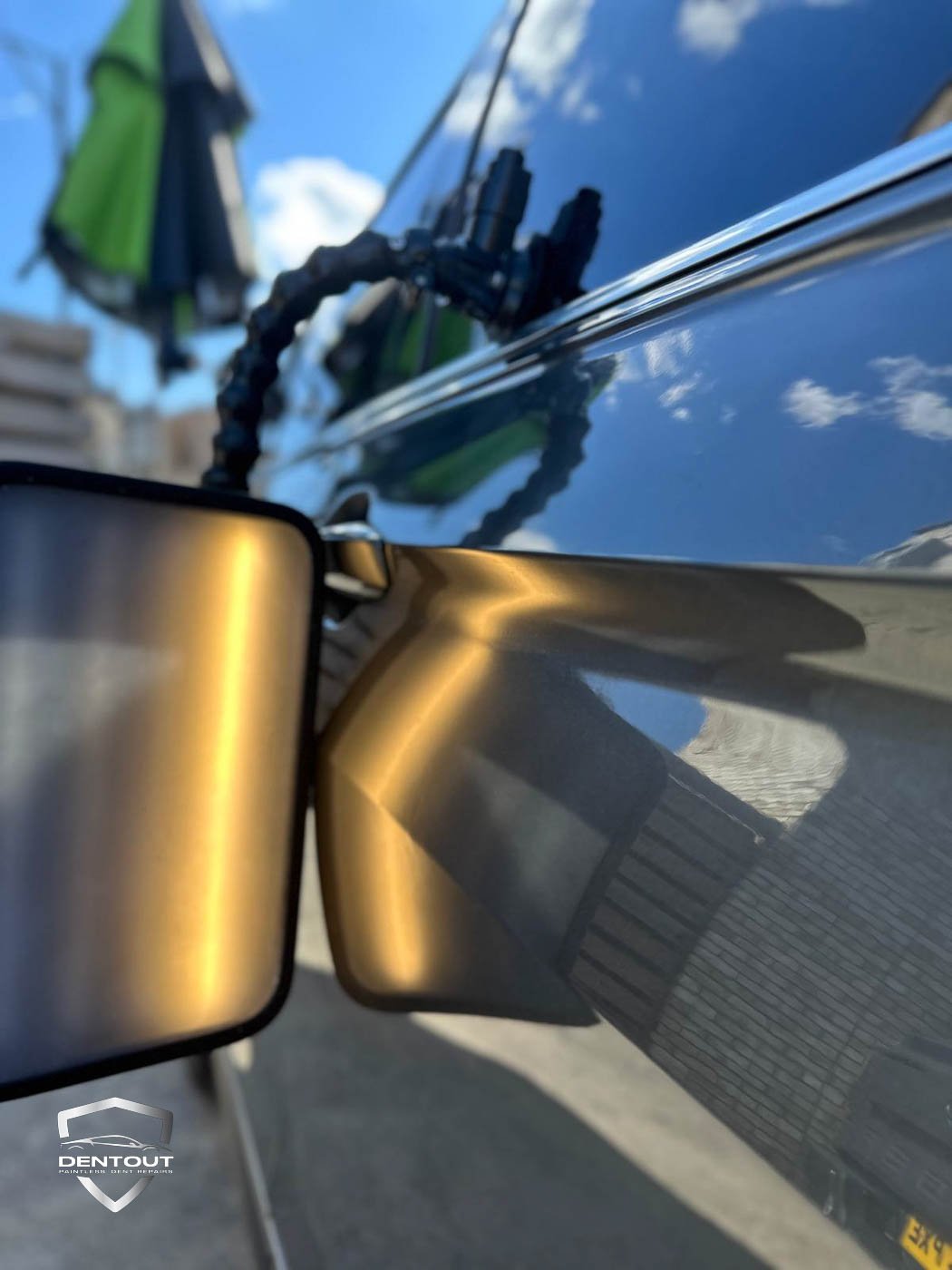 Dent Removal London After Damage was Repaired in a black card side door